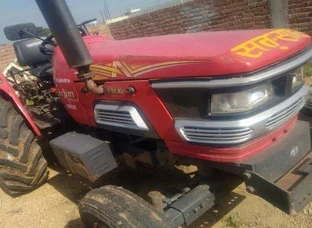 Mahindra arjun + cage wheel + 11far cultivator. 