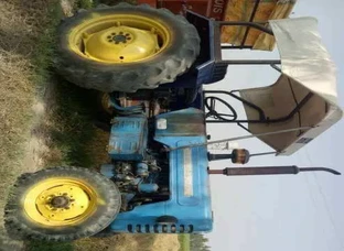 Blue And Black Tractor Toy