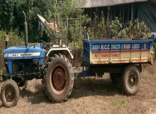 New Holland tractor with trolley. ...very good