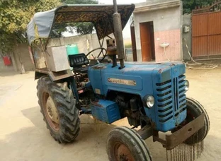 Blue And Black Tractor With Trailer