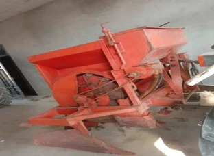 Automatic potato masher